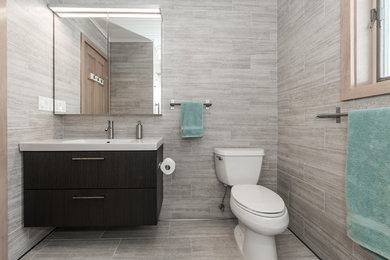 Contemporary Bathroom with Floor to Ceiling Tile