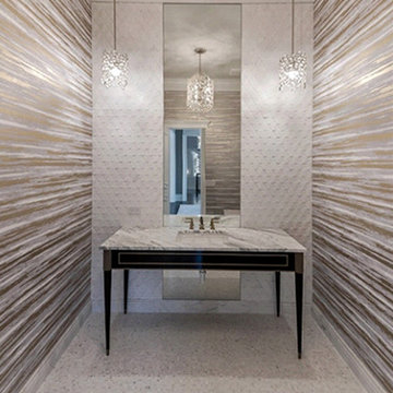 Contemporary bathroom with white marble accent wall