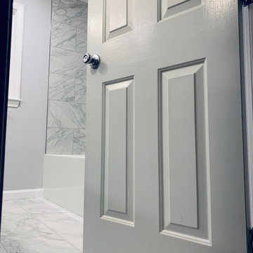 Contemporary Bonavista Bathroom Remodel with Marmol Venatino Tile Shower