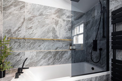 Design ideas for a medium sized contemporary family bathroom in London with a built-in bath.