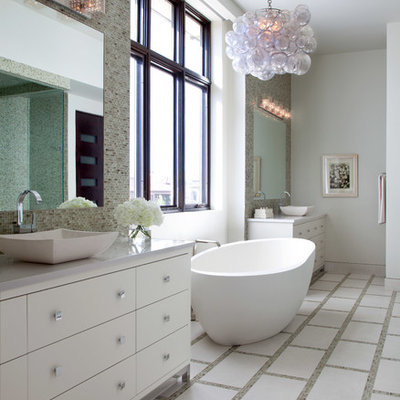 Inspiration for a contemporary freestanding bathtub remodel in Denver with a vessel sink