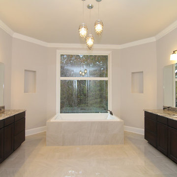 Contemporary master bath with crystal pendants
