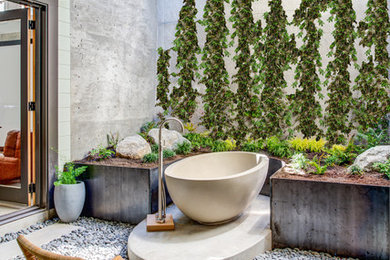 Inspiration for a mid-century modern master freestanding bathtub remodel in San Francisco