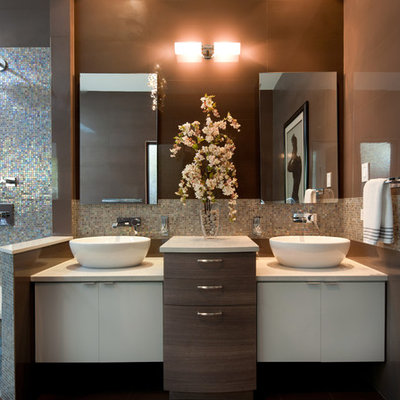 Bathroom - large contemporary master brown tile and ceramic tile ceramic tile bathroom idea in Other with a vessel sink, flat-panel cabinets, white cabinets, brown walls and quartz countertops