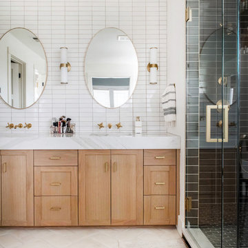 Contemporary White Bathroom Tile with Dark Shower Tile