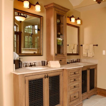 Contrasting Colored Glazed Lattice Front Raised Panel Vanity in the Master Bath
