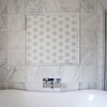Cool, calming bathroom with statement star mosaic tiles