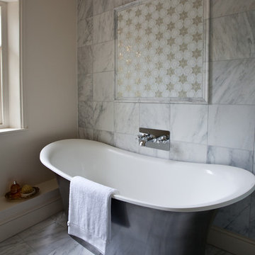 Cool, calming bathroom with statement star mosaic tiles