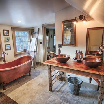 Copper claw-foot tub, and copper fixtures