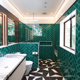 Design ideas for a large contemporary master bathroom in Brisbane with furniture-like cabinets, light wood cabinets, green tile, ceramic tile, white walls, ceramic floors, an undermount sink, an open shower, an alcove shower, a one-piece toilet, multi-coloured floor and grey benchtops.