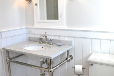 Example of a small classic master white tile and subway tile marble floor alcove shower design in New York with marble countertops, a two-piece toilet and gray walls