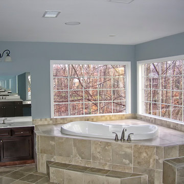 Corner Jacuzzi Tub with Marble Seating to Bringing the Outdoor View Inside
