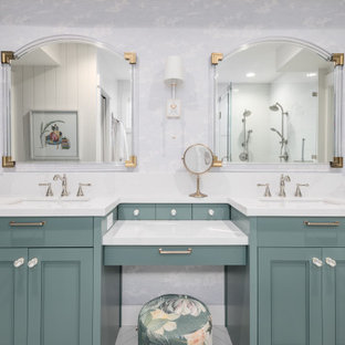 Photo of a transitional master bathroom in Salt Lake City with recessed-panel cabinets, turquoise cabinets, a corner shower, white tile, white walls, an undermount sink, white floor, a hinged shower door and white benchtops.