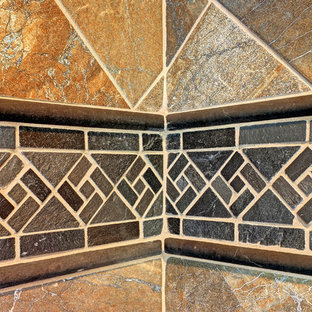 Inspiration for a large craftsman master black tile and porcelain tile walk-in shower remodel in Seattle with multicolored walls