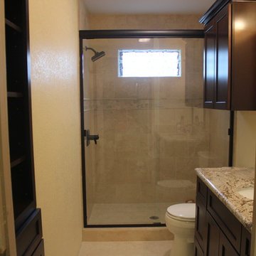 Crema Marfil Marble Shower w/Frameless Glass Slider and Java Cherry Cabinets
