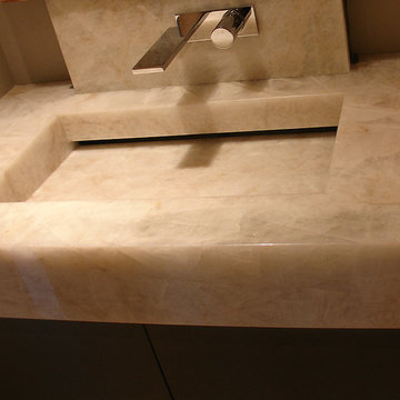 Cristallo quartzite vanity top with integrated mitred sink