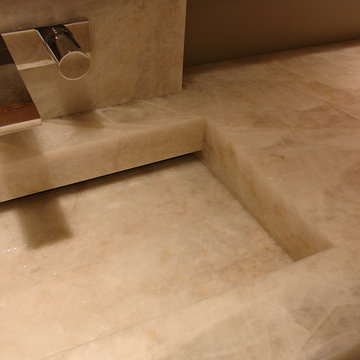 Cristallo quartzite vanity top with integrated mitred sink