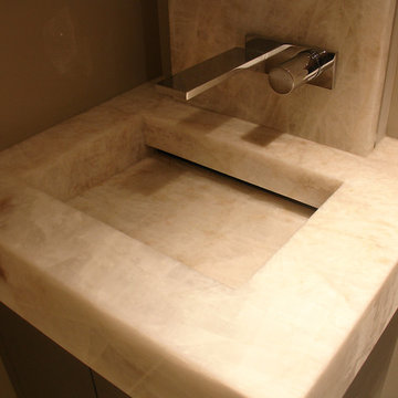 Cristallo quartzite vanity top with integrated mitred sink