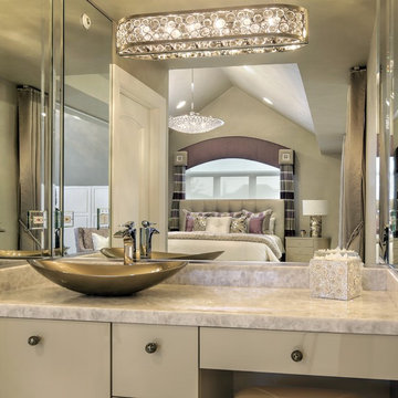Crystal and Polished Nickel Light Fixture in Ensuite Bathroom with Vessel Sink