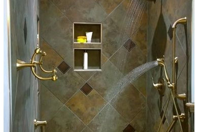 Alcove shower - traditional beige tile, gray tile and ceramic tile mosaic tile floor and multicolored floor alcove shower idea in Indianapolis with multicolored walls