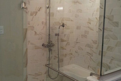 Bathroom - mid-sized traditional master beige tile and stone tile ceramic tile bathroom idea in St Louis with beige walls, raised-panel cabinets, dark wood cabinets, a two-piece toilet, an undermount sink and granite countertops