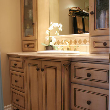 Custom bathroom vanity, traditional design, parchment painted finish and trim