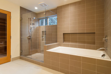 Bathroom - mid-sized modern master brown tile and ceramic tile ceramic tile bathroom idea in Toronto with a vessel sink, white cabinets, a two-piece toilet and beige walls
