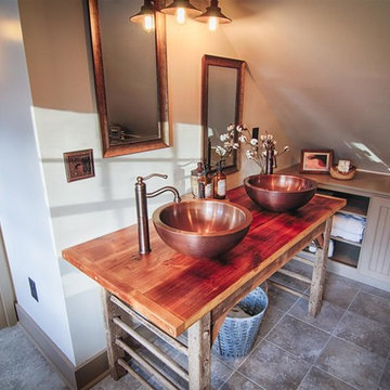 Custom built table vanity with copper vessel sinks