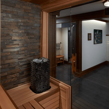 Custom Finnleo Sauna with Himalaya Heater and Stone Wall