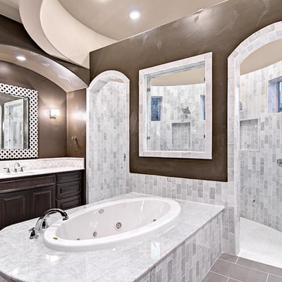 Inspiration for a timeless white tile and stone tile bathroom remodel in Austin