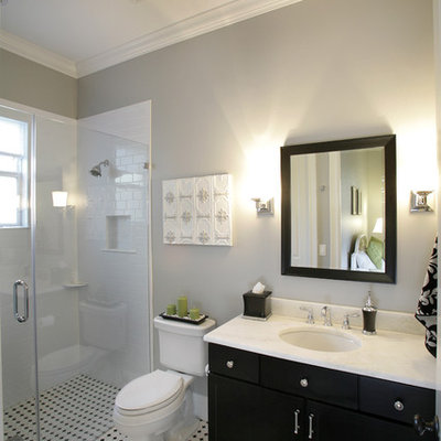Example of a trendy subway tile walk-in shower design in Tampa