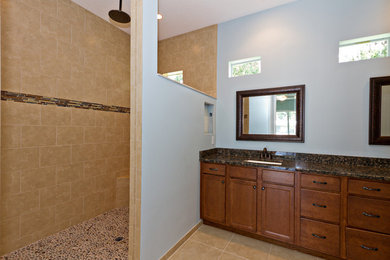 Island style bathroom photo in Miami with granite countertops