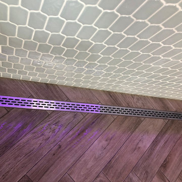 Custom made shower slope and Stainless Steel channel drain from KBRS