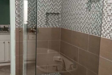 Example of a mid-sized trendy master beige tile, gray tile and porcelain tile ceramic tile bathroom design in Other with shaker cabinets, white cabinets, beige walls, an undermount sink and granite countertops