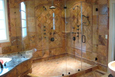 Alcove shower - mid-sized rustic master beige tile, brown tile and ceramic tile ceramic tile alcove shower idea in Other with an undermount tub, brown walls, a vessel sink and granite countertops