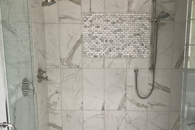 Doorless shower - contemporary multicolored tile and mosaic tile mosaic tile floor and multicolored floor doorless shower idea in Other with a hinged shower door