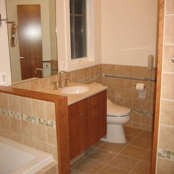 Custom vanity with toilet outside of bathing area