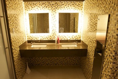 Huge minimalist beige tile and ceramic tile ceramic tile and beige floor bathroom photo in Miami with beige walls