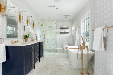 Example of a large trendy master white tile and marble tile marble floor and white floor bathroom design in Dallas with furniture-like cabinets, blue cabinets, a one-piece toilet, blue walls, an undermount sink, quartz countertops, a hinged shower door and white countertops