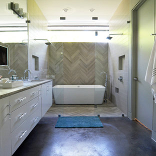 Bathroom - contemporary master gray tile concrete floor bathroom idea in Dallas with an undermount sink, flat-panel cabinets, white cabinets and beige walls