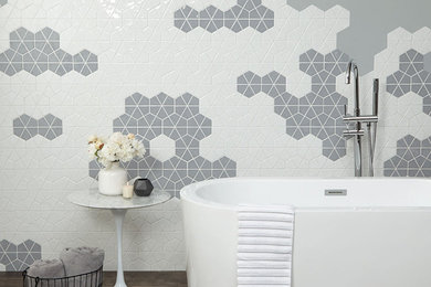 Mid-sized trendy master gray tile and ceramic tile porcelain tile and blue floor freestanding bathtub photo in Philadelphia