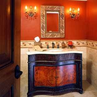 Photo of an asian bathroom in San Francisco with marble benchtops and red walls.