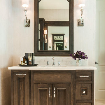 Dark Stained Wood Vanity with White Countertops