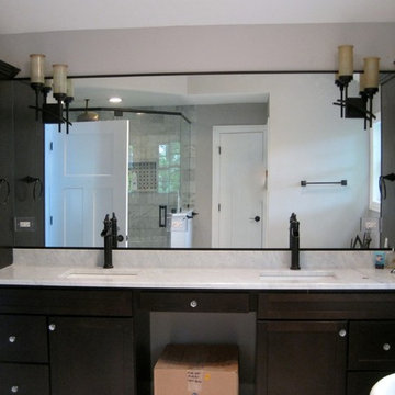 dark wood master bathroom vanities, granite top, square bowls, oil-rubbed bronze