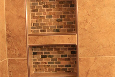 Example of a transitional beige tile and ceramic tile bathroom design in Other