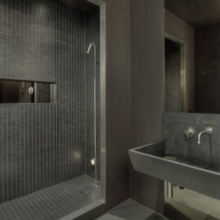This is an example of an industrial bathroom in New York with a trough sink.