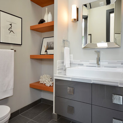 Bathroom - contemporary bathroom idea in Vancouver with a vessel sink and gray cabinets