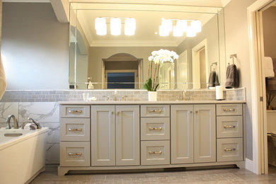 Large master gray tile bathroom photo in Seattle with shaker cabinets, gray cabinets, gray walls and quartzite countertops