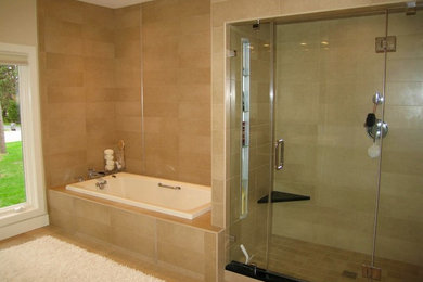 Mid-sized transitional master beige tile and porcelain tile travertine floor and beige floor bathroom photo in Other with beige walls and a hinged shower door