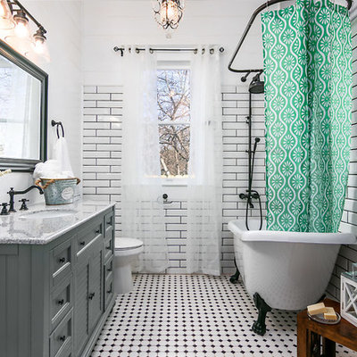 Example of a country 3/4 white tile and subway tile multicolored floor bathroom design in Austin with louvered cabinets, gray cabinets, white walls, an undermount sink and gray countertops